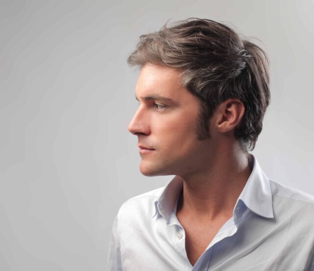 Profile view of a man showing his jawline